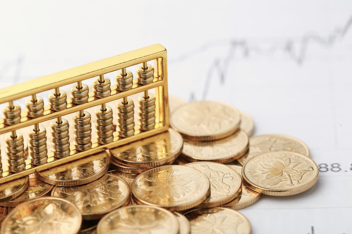金幣與金色算盤